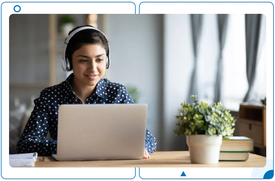 Woman using headphone at Laptop