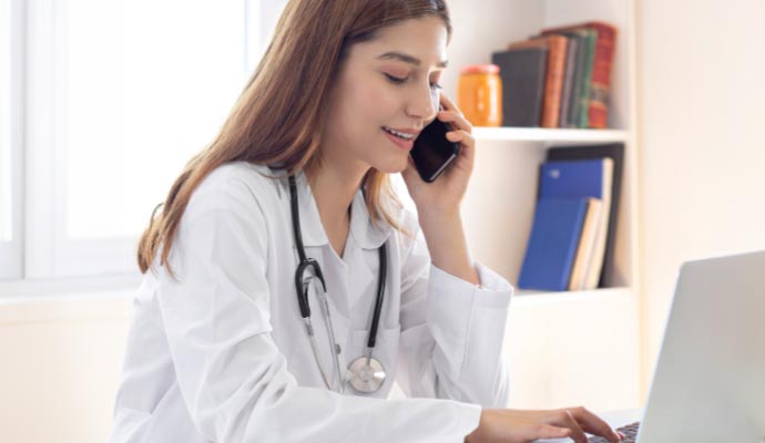 A doctor using cloud communication system